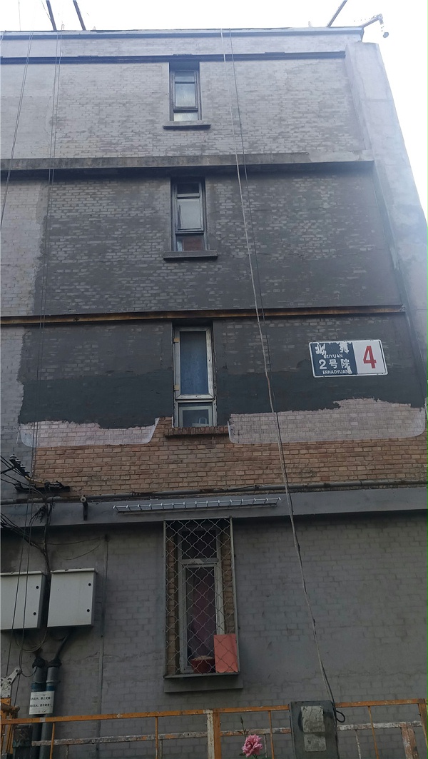 旧楼外墙翻新改造挂网抹灰